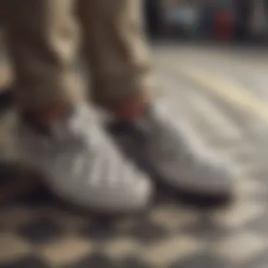 Close-up of checkered Vans with custom artwork and designs.