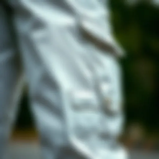 Close-up of Dickies white cargo pants showcasing the fabric texture and stitching details.