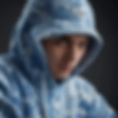 A close-up of a blue and white tie-dye hoodie showcasing its texture