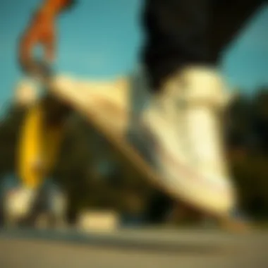 Skateboarder performing tricks while wearing cream Chuck Taylor high tops.