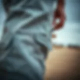 A close-up look at the fabric of light grey cargo trousers showcasing their texture and details.