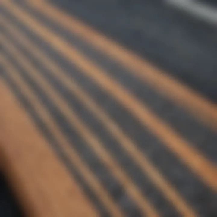 Close-up view of textured longboard deck tape showcasing grip patterns