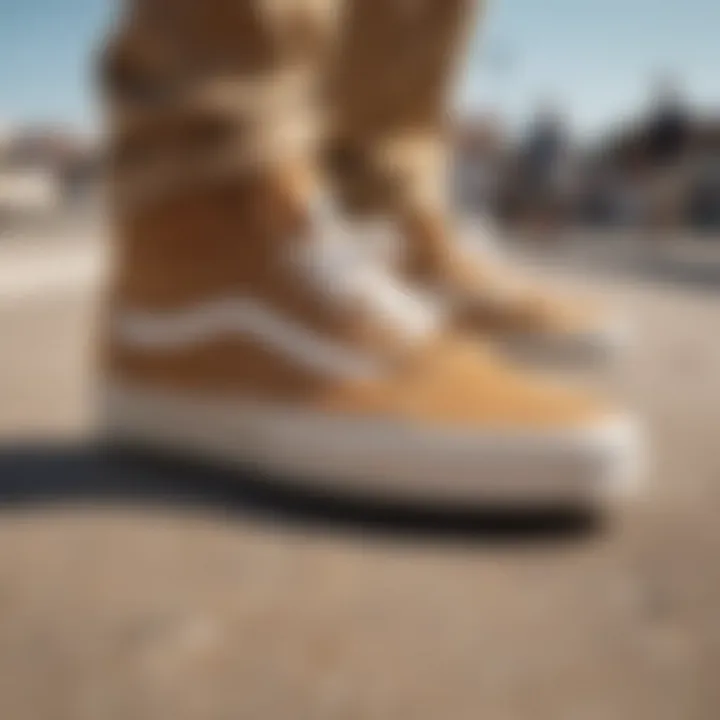 Skateboarder wearing tan Vans performing a trick