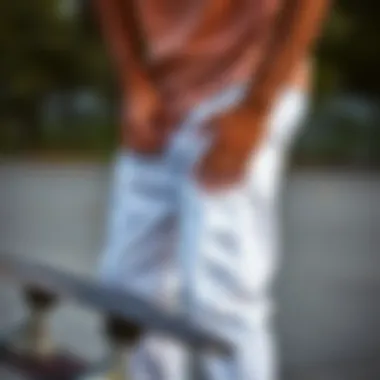 A person maintaining Mnml white jeans, emphasizing care tips and maintenance.