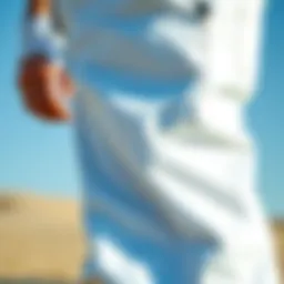 A stylish close-up of Mnml white jeans showcasing the unique fabric texture.