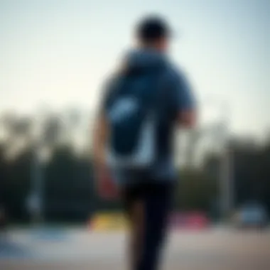 Skateboarder carrying a Nike backpack on a skate park