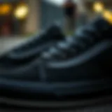 Close-up view of old skool platform Vans in all black showcasing the texture and details.