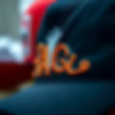A close-up of a snapback hat emphasizing its unique embroidery and design