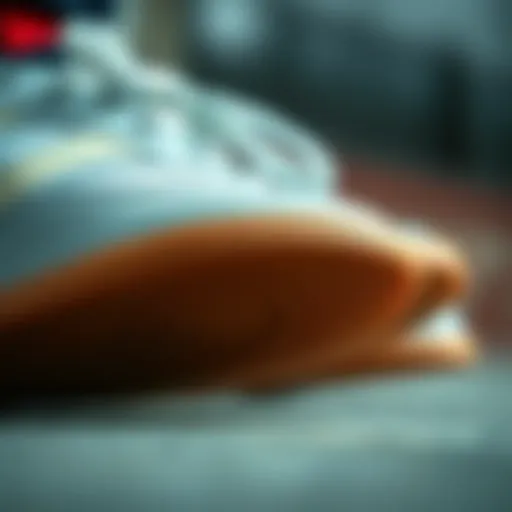 Detailed view of the Adidas Forum Low gum sole showcasing its unique texture and design.