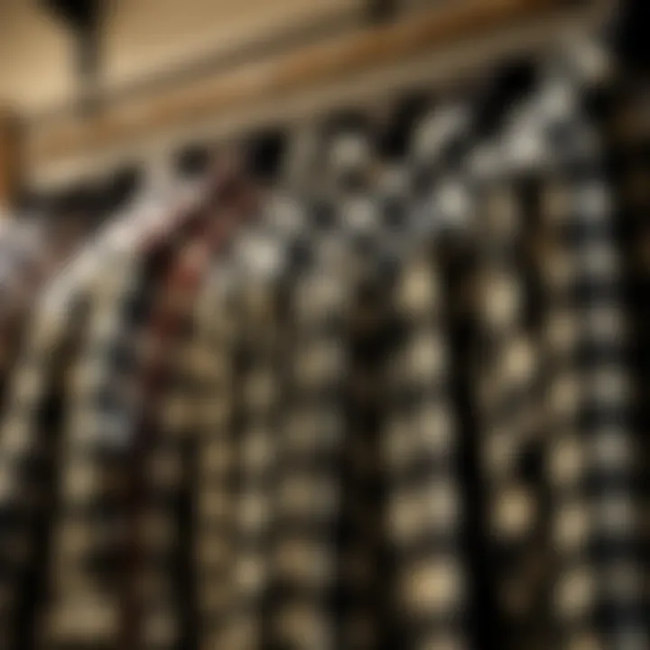 A collection of various black and white check flannel shirts hung in a stylish arrangement.