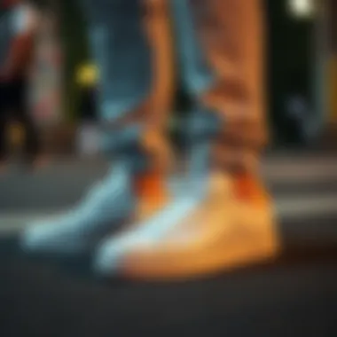 Pair of white Adidas sneakers paired with stylish casual attire