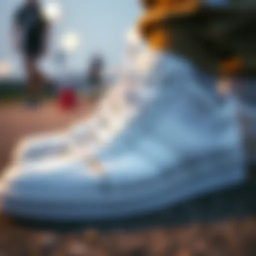 Close-up view of white Adidas sneakers showcasing intricate design details