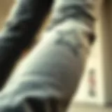 A close-up of rock star skinny jeans showcasing unique stitching and style.