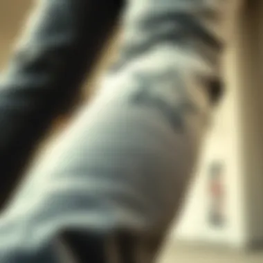 A close-up of rock star skinny jeans showcasing unique stitching and style.