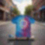 A vibrant blue tie dye t-shirt displayed against a skateboard, symbolizing skate culture.