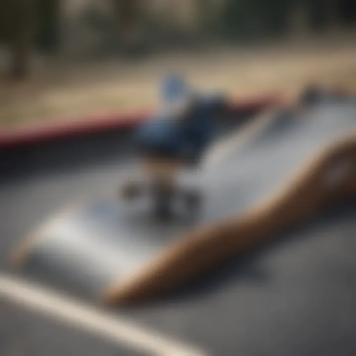 Close-up of a tech deck on a miniature skateboard ramp