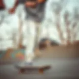 White cargo joggers showcased in a skate park setting