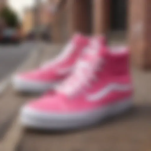 Stylish pink Vans high tops on a vibrant urban background