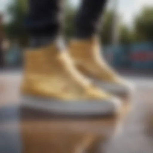 Close-up view of gold high top Vans on a skate park surface