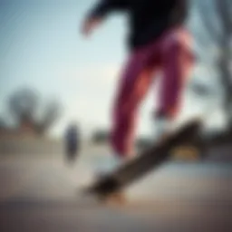 A skater in Nike fleece trackpants performing a trick on a skateboard