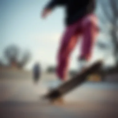 A skater in Nike fleece trackpants performing a trick on a skateboard