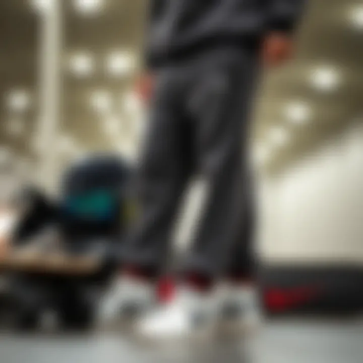 Stylish arrangement of Nike fleece trackpants with skateboarding gear