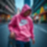 Stylish pink Nike sweatshirt on a skateboard in urban setting
