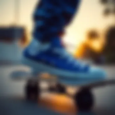 Royal blue Converse low tops on a skateboard
