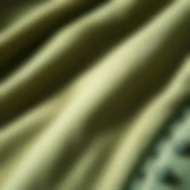 Close-up of sage corduroy fabric texture highlighting sustainability