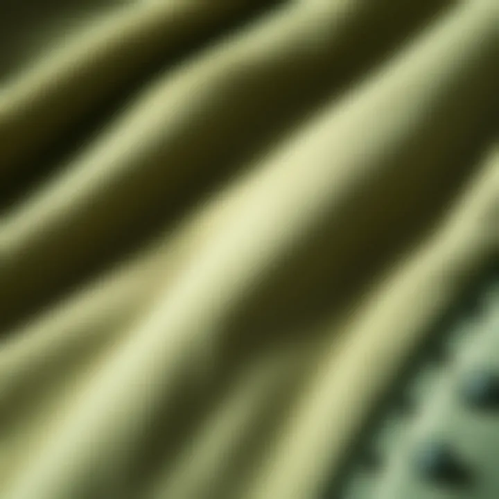 Close-up of sage corduroy fabric texture highlighting sustainability
