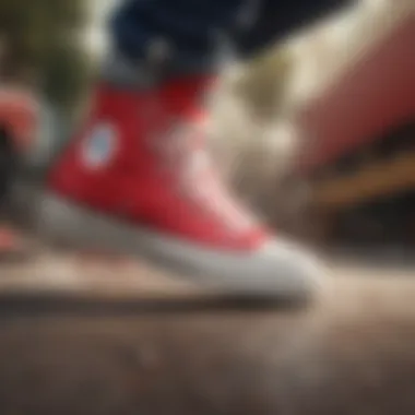 Skateboarder performing a trick while wearing Converse Chuck Taylor red shoes.