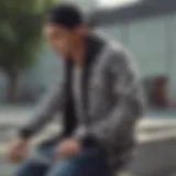 A stylish skater showcasing a checkered jacket in an urban skate park.