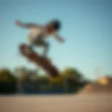 A skateboarder performing an ollie in mid-air