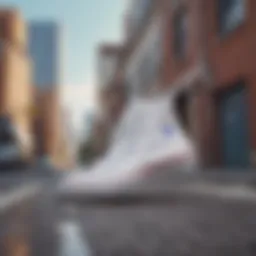 Classic white Converse sneakers against a vibrant urban backdrop